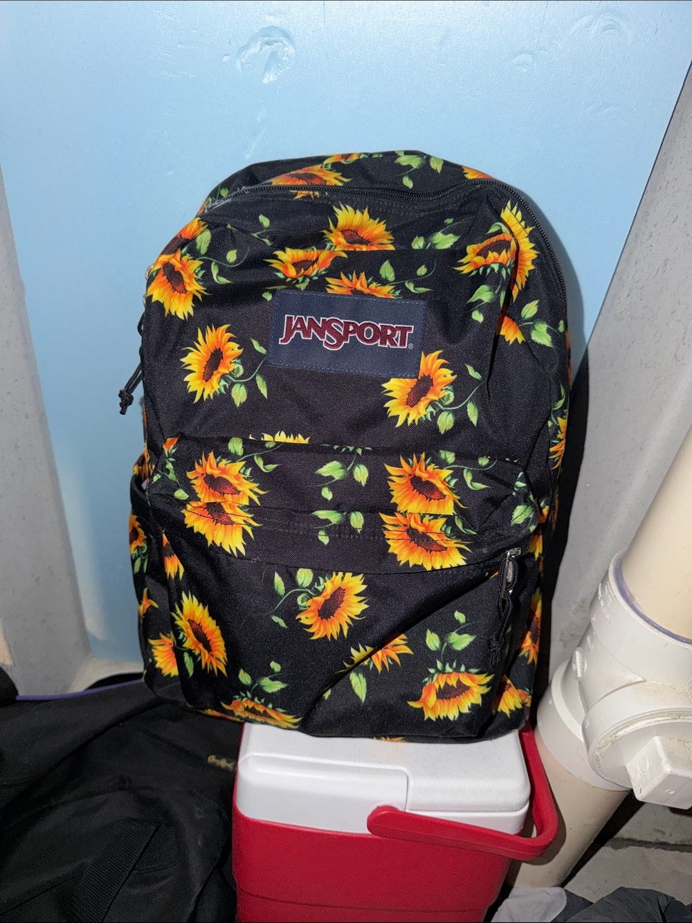 Jansport Black Backpack with Yellow Sunflower Print